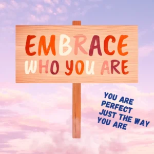 On a pink sky background, sits a wooden sign post with the words "Embrace who you are", and next to it "you are perfect just the way you are."